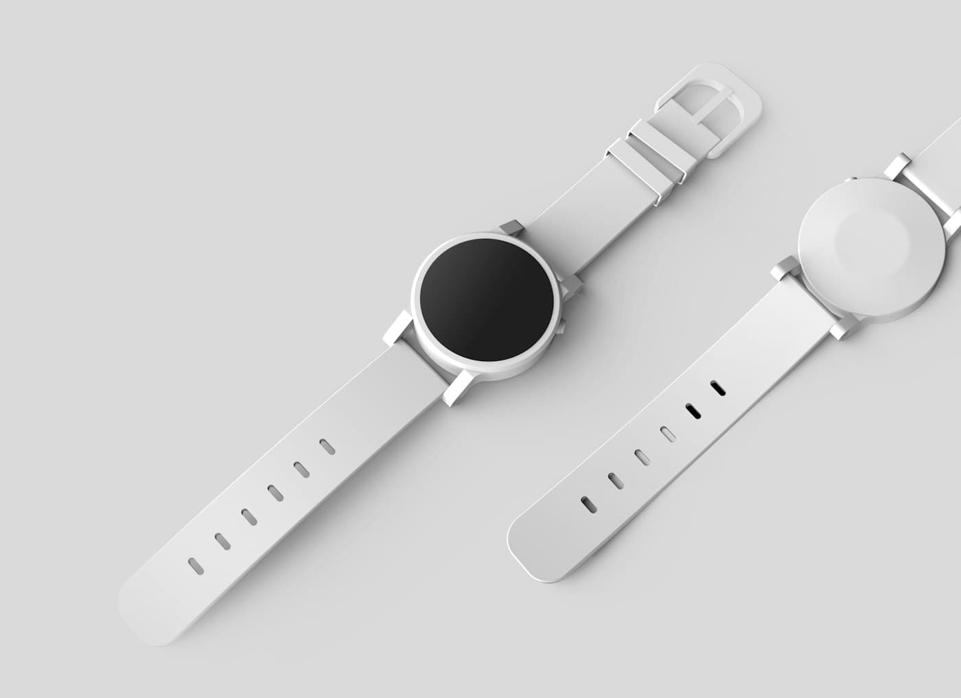 Montre connectée blanche posée sur un fond clair